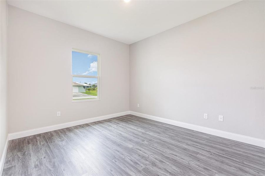 Spacious, unfurnished interior of a new home in , Port Charlotte (Image 21).
