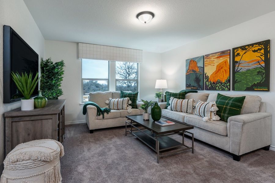 Representative furnished interior of a home built from the 2100 by KB Home in Spanish Trails, San Antonio (Image 5).