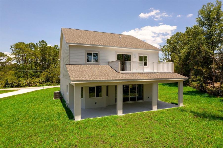 Front exterior of a new home in , Deltona, FL, highlighting curb appeal (Image 27).