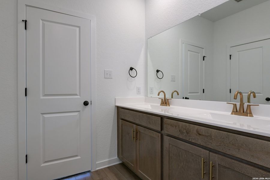 Furnished interior view inside a new home in Nopal Valley, San Antonio (Image 12).
