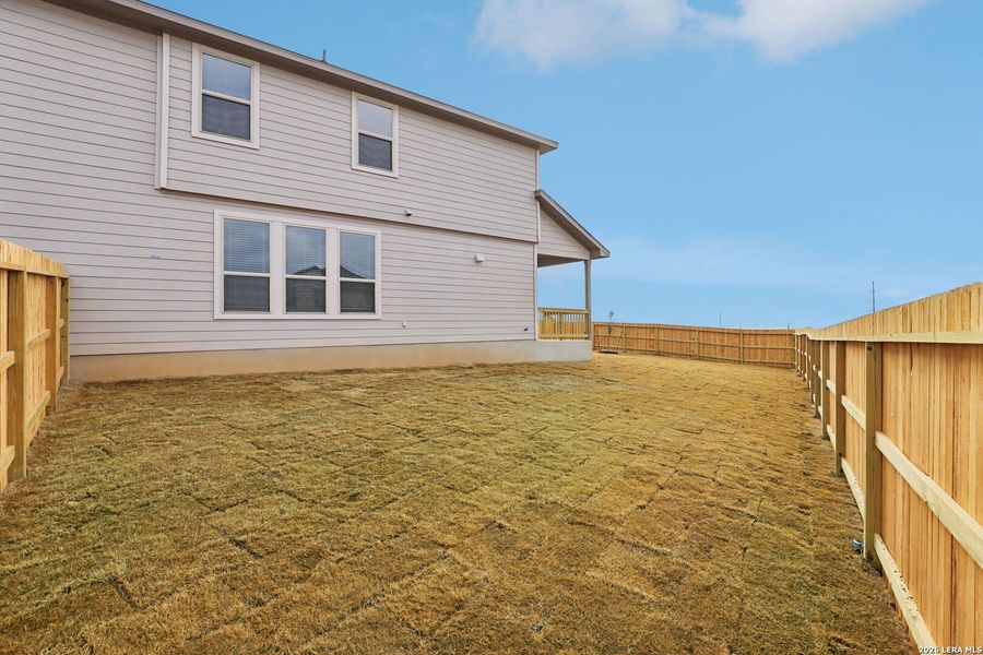 Exterior details and patio area of a home in Lark Canyon, New Braunfels (Image 24).