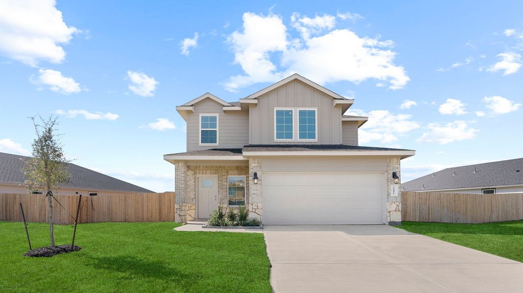 Front exterior of a new home in Lakes at Westland Ranch, League City, TX, highlighting curb appeal (Image 1). Front exterior of a new home in Lakes at Westland Ranch, League City, TX, highlighting curb appeal (Image 1).
