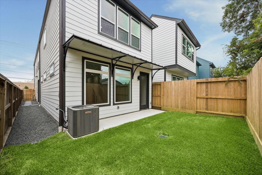 Exterior details and patio area of a home in , Houston (Image 3).