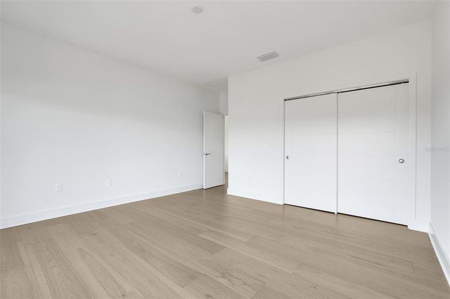 Spacious, unfurnished interior of a new home in Hampton Green at Providence, Davenport (Image 38).