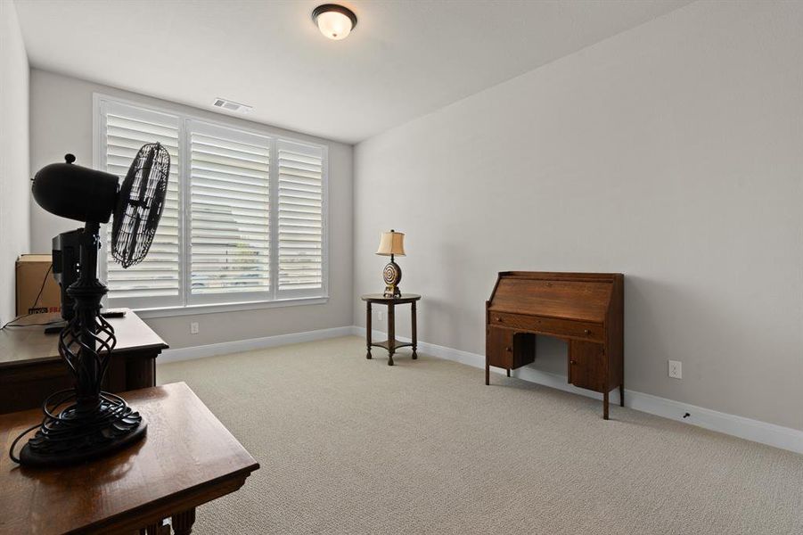 Furnished interior view inside a new home in Pecan Square - Estates, Northlake (Image 16).