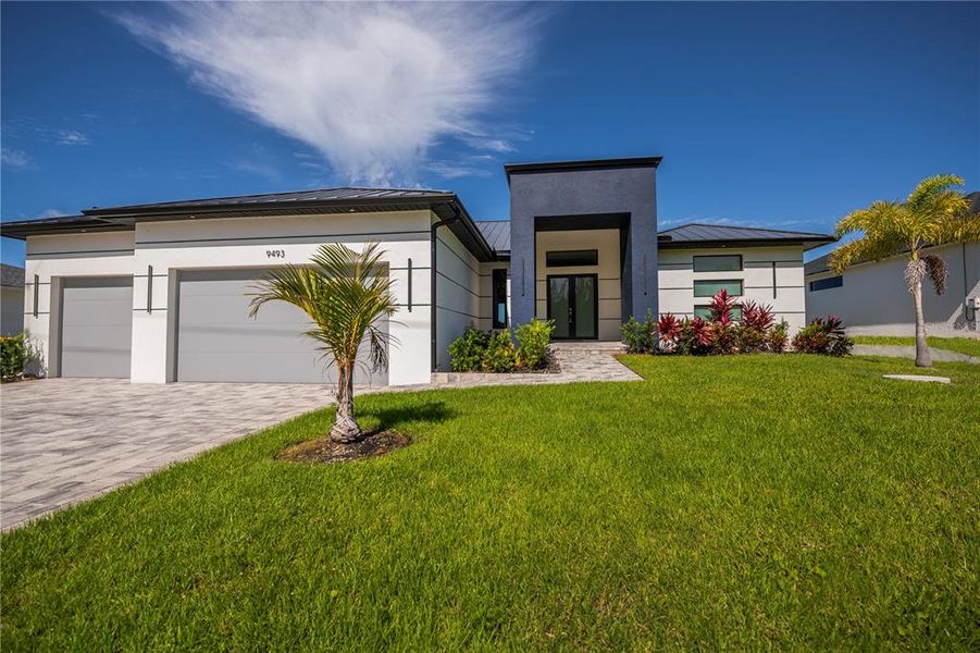 Front exterior of a new home in , Port Charlotte, FL, highlighting curb appeal (Image 2).