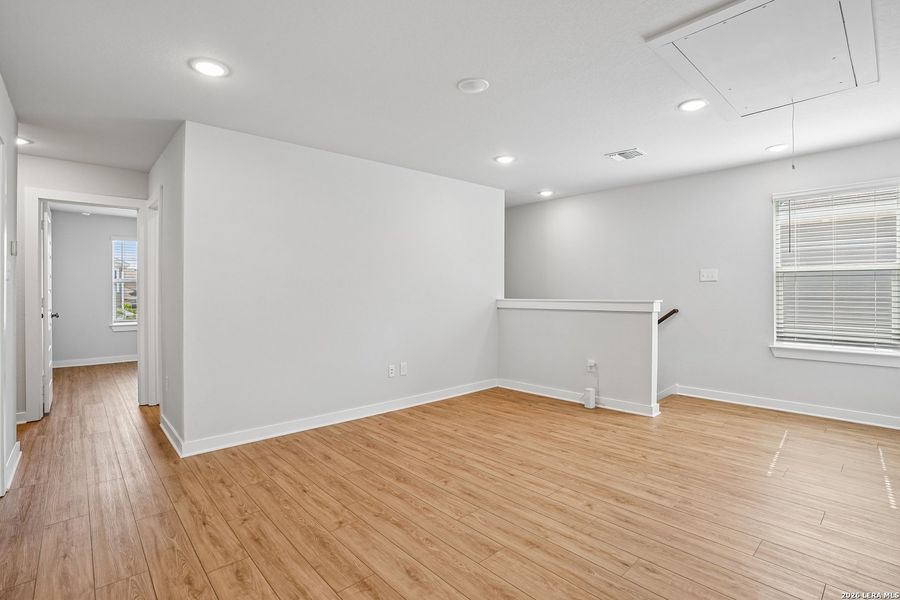 Spacious, unfurnished interior of a new home in University Village, San Antonio (Image 27).