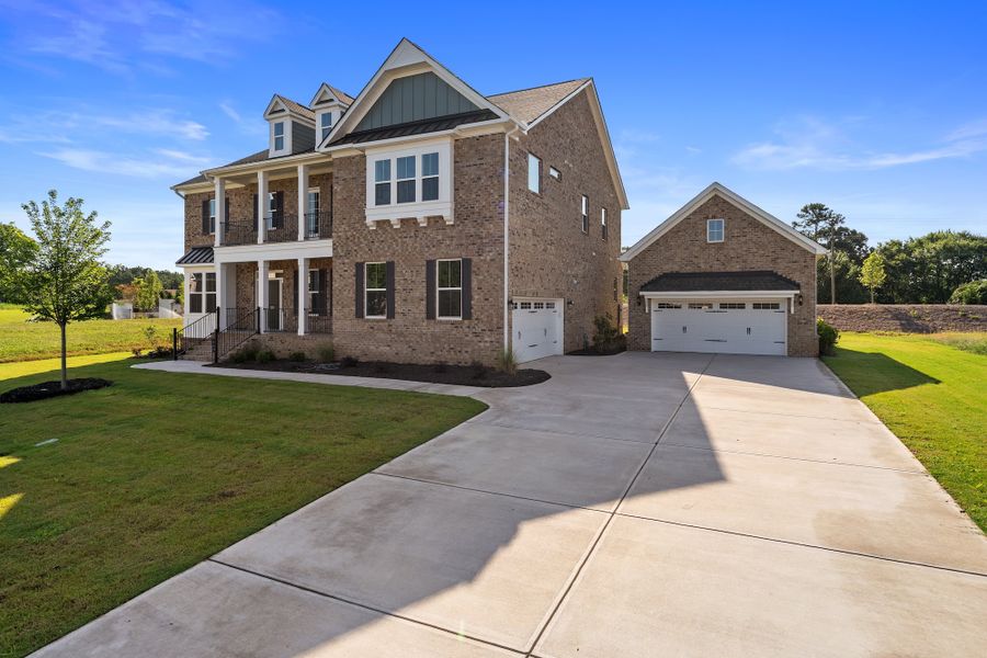 Front exterior of a new home in Walnut Grove, Easley, SC, highlighting curb appeal (Image 29).