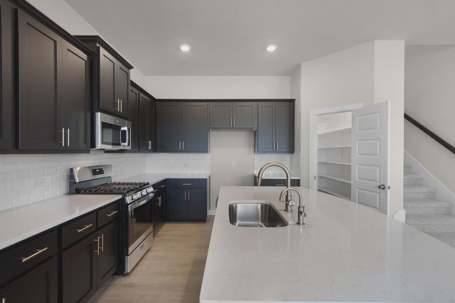 Representative furnished interior of a home built from the Warner by Chesmar Homes in The Grove at Blackhawk, Pflugerville (Image 4).