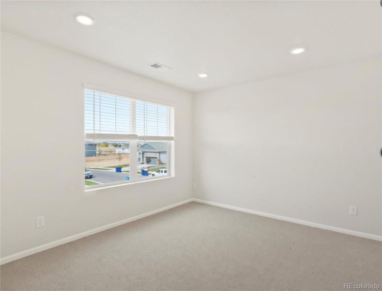 Spacious, unfurnished interior of a new home in Buffalo Highlands: The Flora Collection, Commerce City (Image 17).