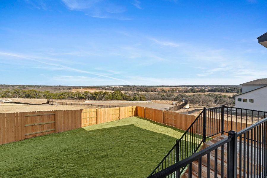 Exterior details and patio area of a home in Lariat, Liberty Hill (Image 4).