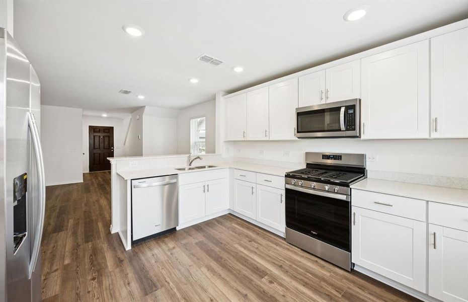 Spacious kitchen with abundant cabinet space