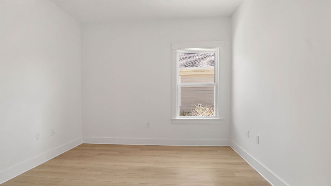 Representative unfurnished interior of a home built from the Magnolia by D.R. Horton in Breakfast Point East Phase II, Panama City Beach (Image 33).