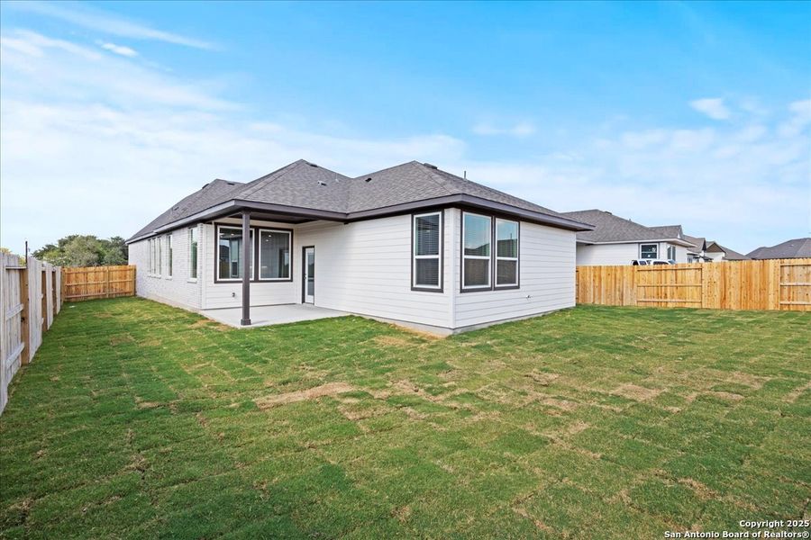 Exterior details and patio area of a home in Village at Three Oaks, Seguin (Image 4). Exterior details and patio area of a home in Village at Three Oaks, Seguin (Image 4).