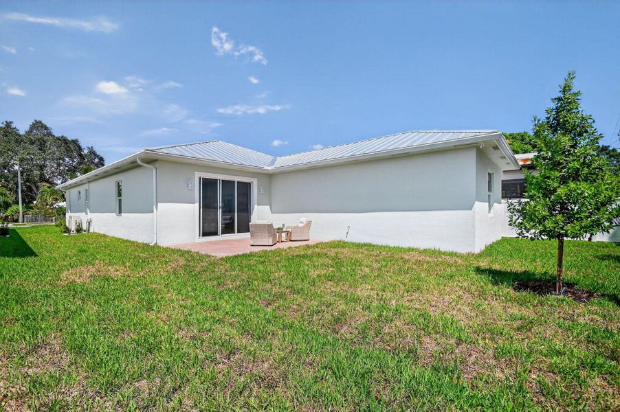 Front exterior of a new home in , Jupiter, FL, highlighting curb appeal (Image 2).