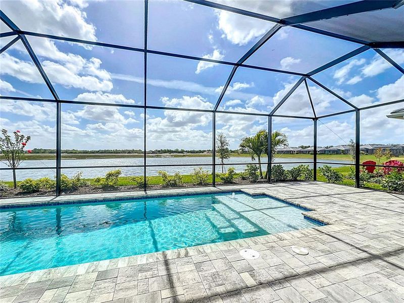 Exterior details and patio area of a home in Watercolor Place, Bradenton (Image 32).