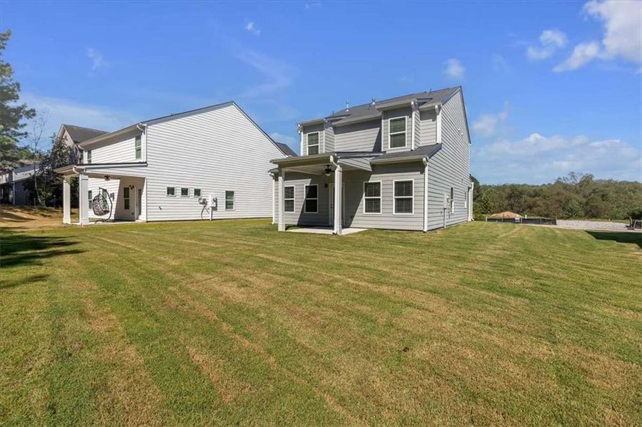 Exterior details and patio area of a home in The View at Groover's Lake, Lithia Springs (Image 4).