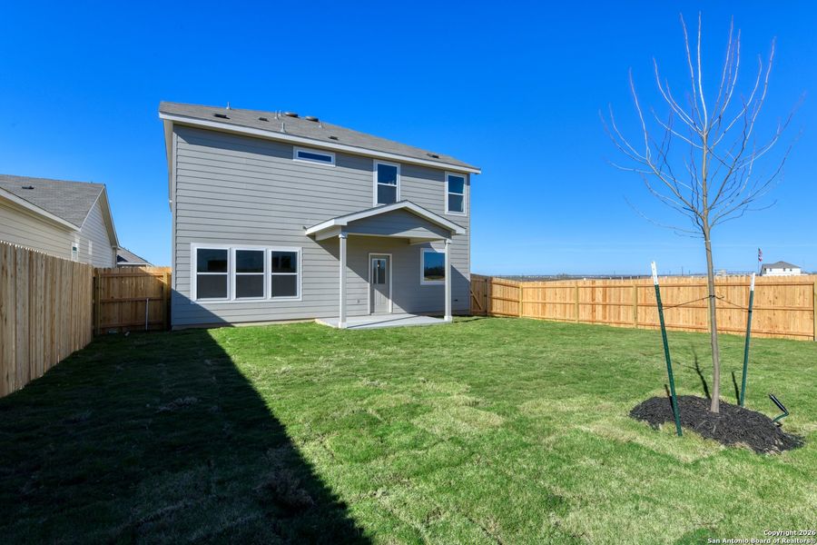 Exterior details and patio area of a home in The Arbors at the Wilder, Adkins (Image 3).