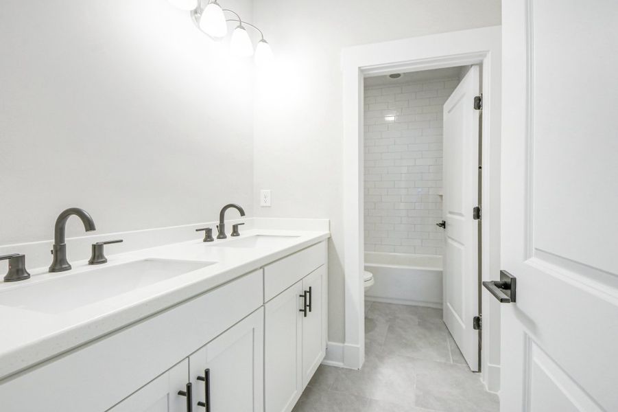 Representative furnished interior of a home built from the Julington by Riverside Homes in Hidden Creek at SilverLeaf 70' Series, St. Augustine (Image 12).