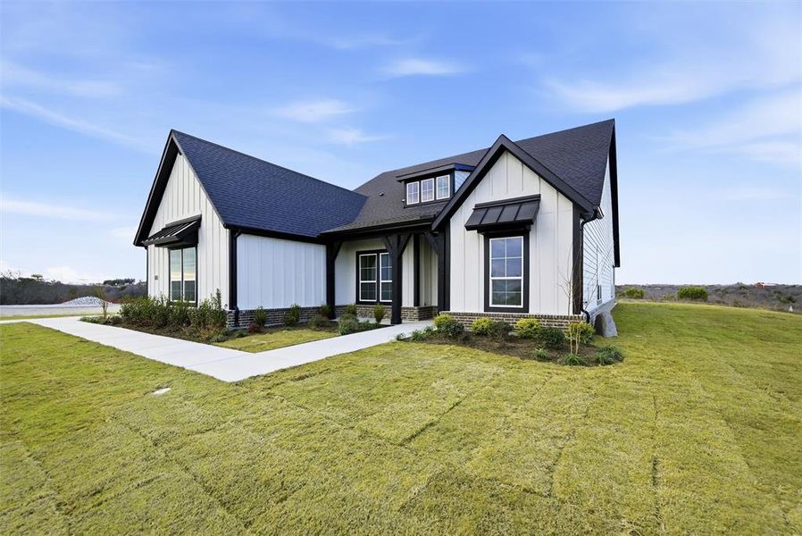 Front exterior of a new home in Eagle Ridge Estates, Weatherford, TX, highlighting curb appeal (Image 24).