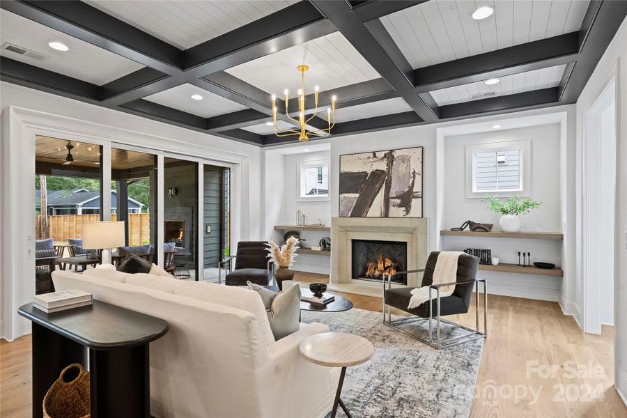 Cast stone fireplace, coffered ceiling