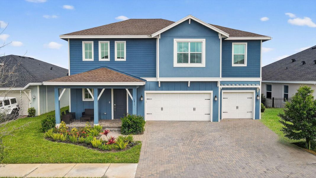 Front exterior of a new home in , Loxahatchee, FL, highlighting curb appeal (Image 27).
