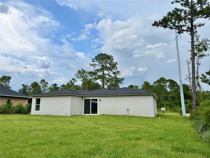 Front exterior of a new home in , Deland, FL, highlighting curb appeal (Image 20).