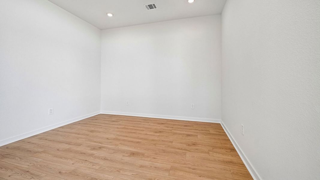 Spacious, unfurnished interior of a new home in The Enclave at Bar W Ranch, Leander (Image 44).