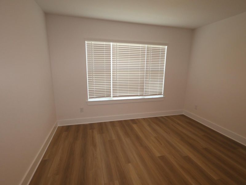 Spacious, unfurnished interior of a new home in Hallimore Ranch, Rosenberg (Image 26).