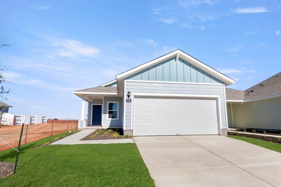 Front exterior of a new home in Harvest Ridge, Elgin, TX, highlighting curb appeal (Image 2).