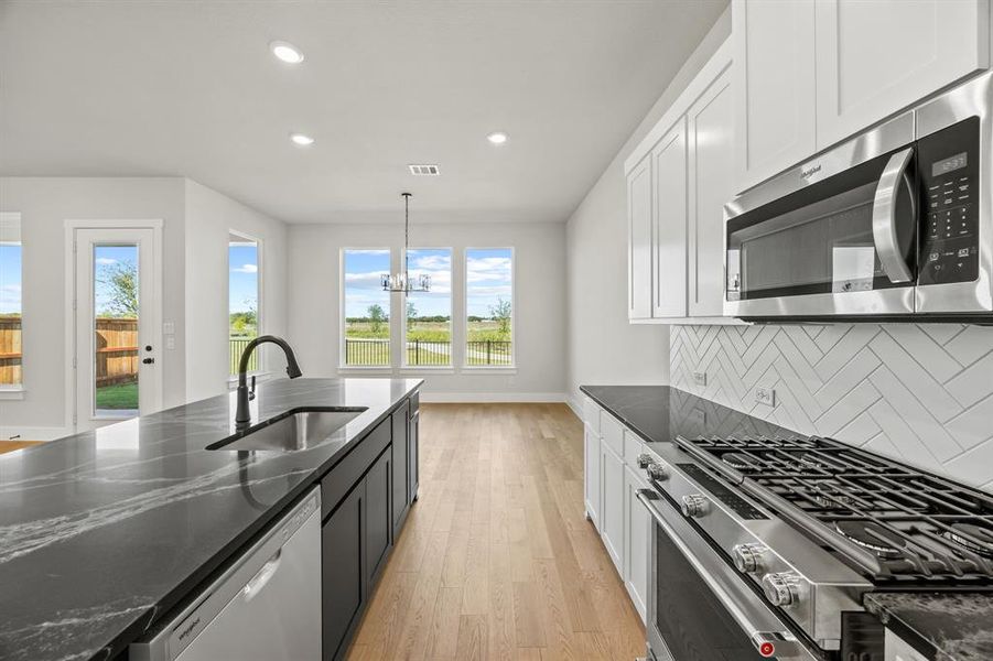Furnished interior view inside a new home in North Square at Uptown, Celina (Image 8).