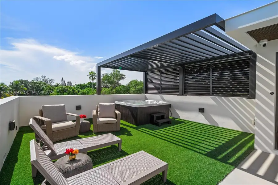 Exterior details and patio area of a home in , Miami (Image 24). Exterior details and patio area of a home in , Miami (Image 24).