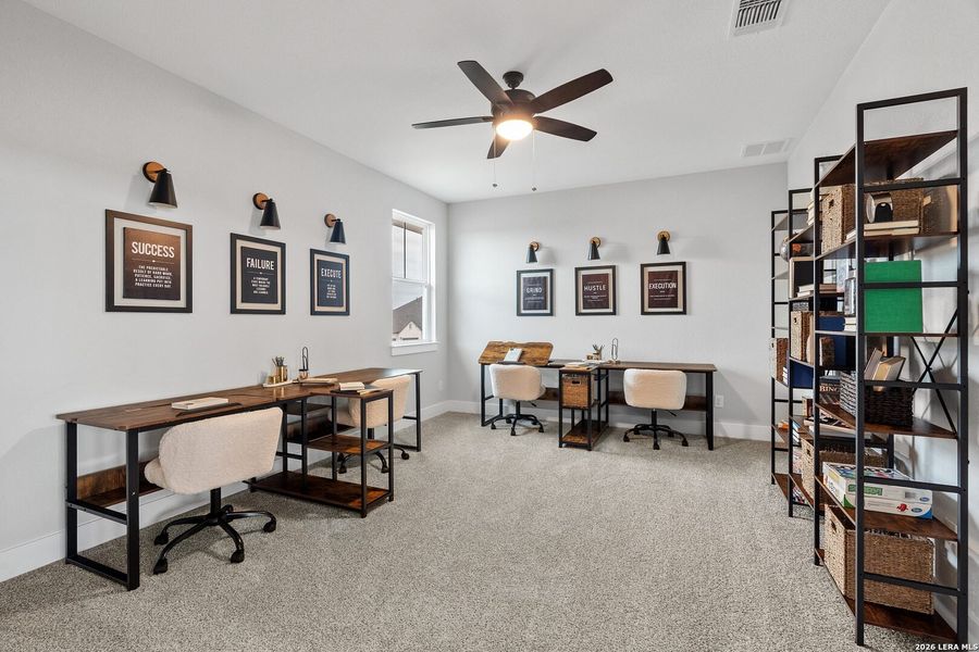 Furnished interior view inside a new home in Village at Three Oaks, Seguin (Image 11).