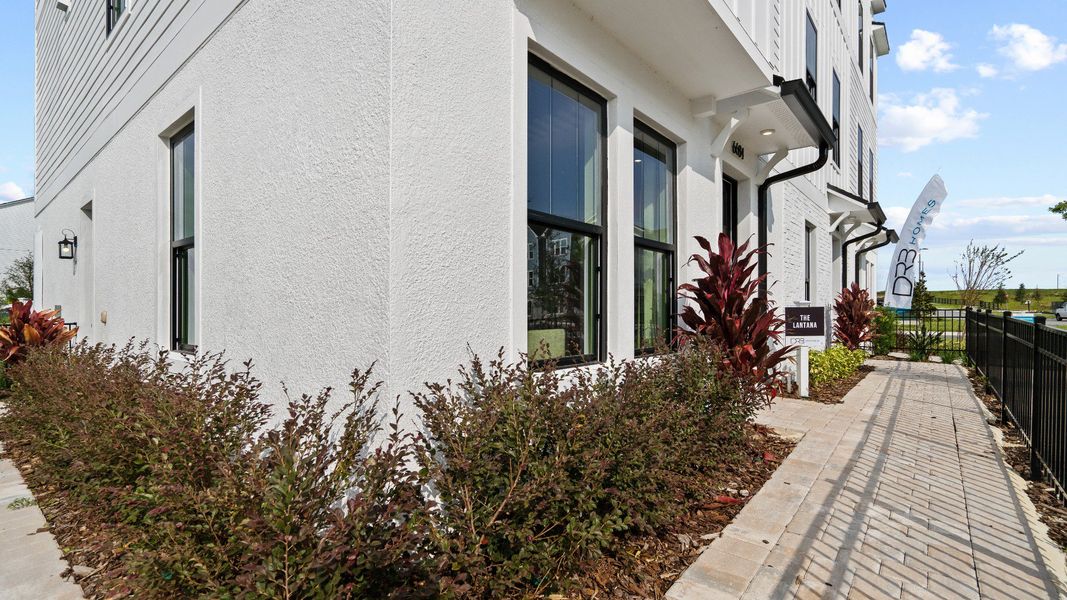Representative exterior details of a home built from the Lantana End Unit by DRB Homes in Parkview at Hamlin, Winter Garden (Image 3).