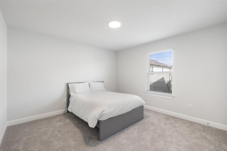 Furnished interior view inside a new home in Messinger Village, Austin (Image 24).