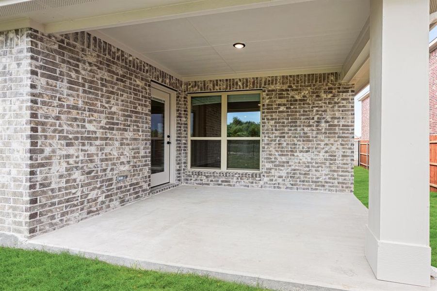 Exterior details and patio area of a home in Parks of Aledo, Aledo (Image 27).