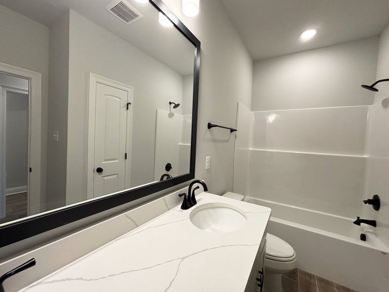 Furnished interior view inside a new home in Bird Song at Hammock Bay, Freeport (Image 10).