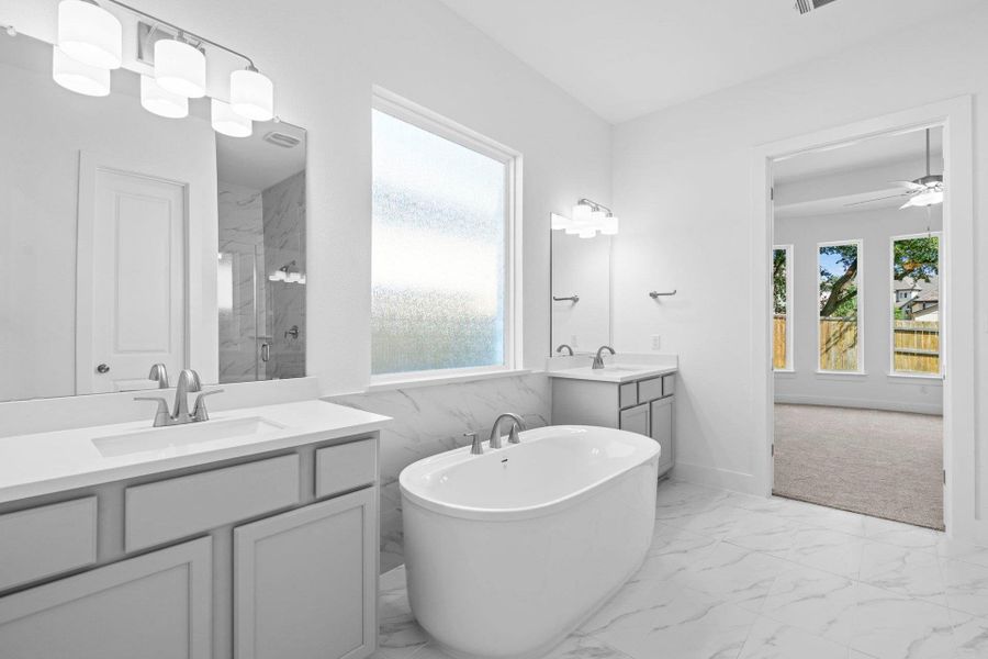 Primary Bath retreat with dual vanities & soaking tub Primary Bath retreat with dual vanities & soaking tub