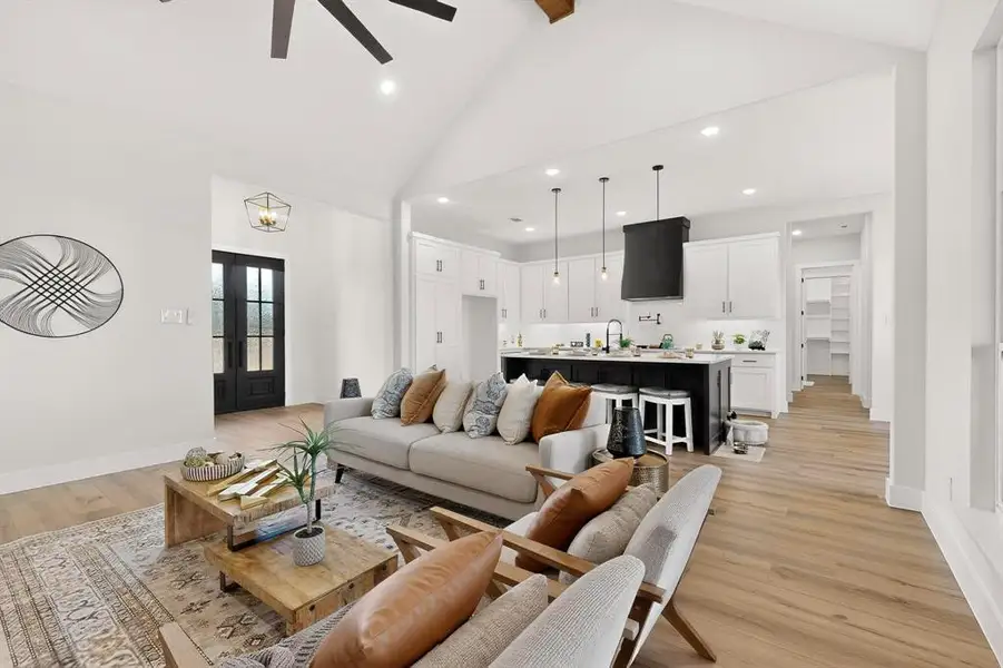 Living area featuring light wood-type flooring, recessed lighting, and ceiling fan