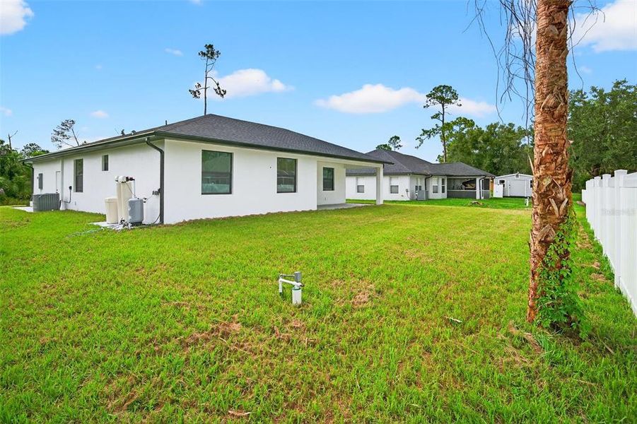 Front exterior of a new home in , North Port, FL, highlighting curb appeal (Image 30). Front exterior of a new home in , North Port, FL, highlighting curb appeal (Image 30).