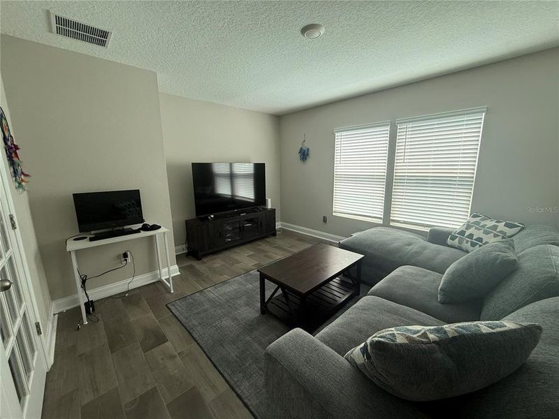 Furnished interior view inside a new home in Sawmill Branch, Palm Coast (Image 6).