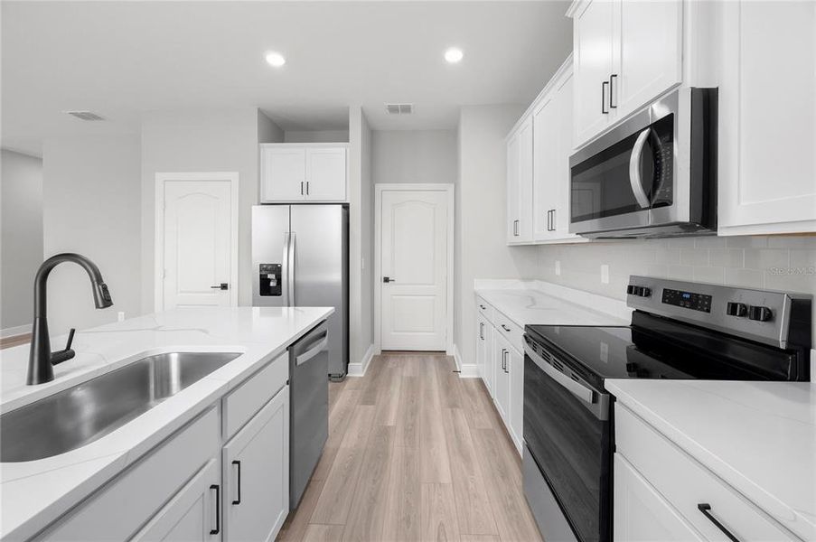 Furnished interior view inside a new home in Citrus Place, Babson Park (Image 11).