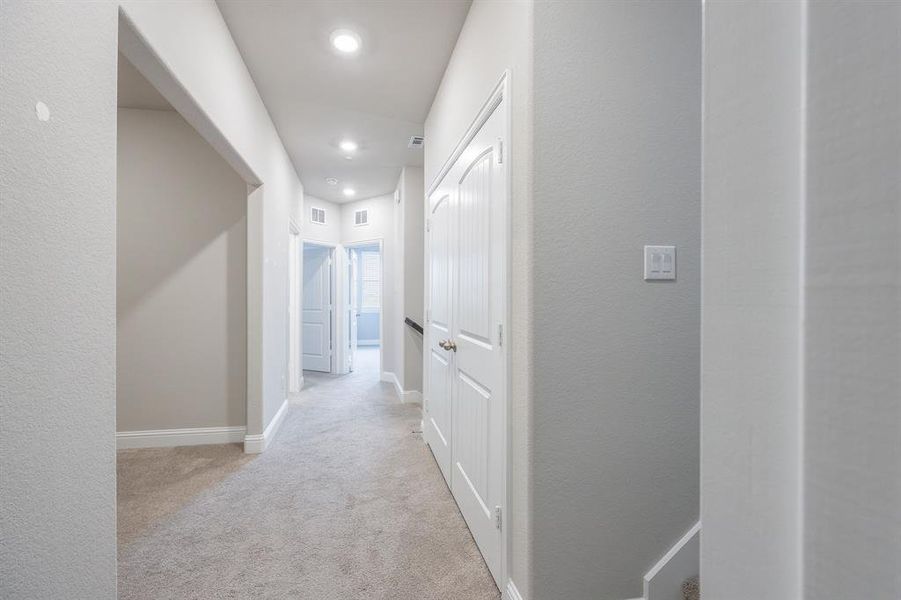 2nd floor hallway with a flex room, a laundy utility room that includes a washer and dryer that can covey to the new buyer - View