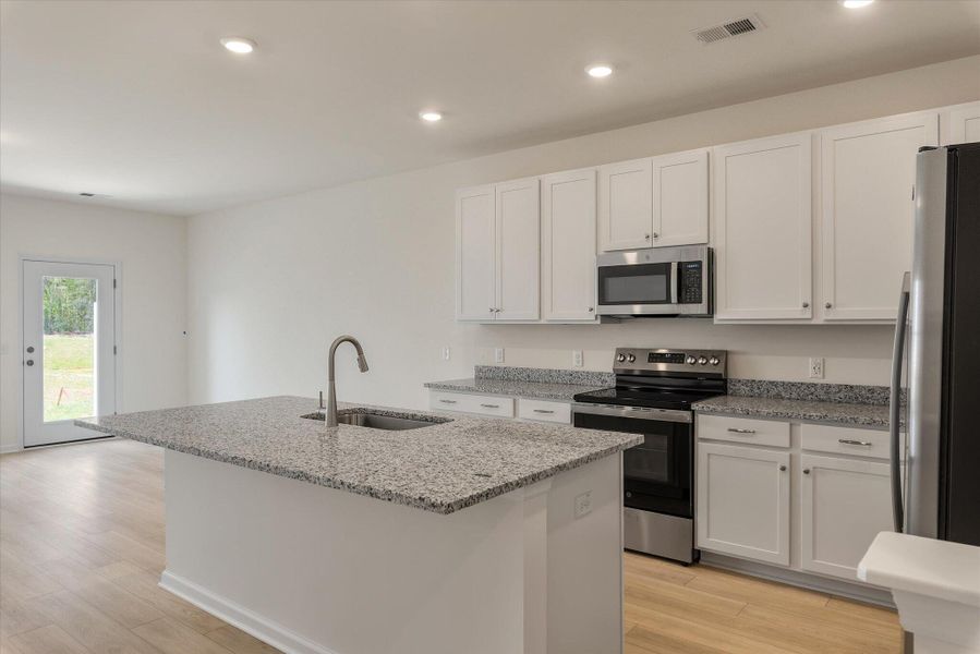 Furnished interior view inside a new home in The Landings at Montague, Goose Creek (Image 8).