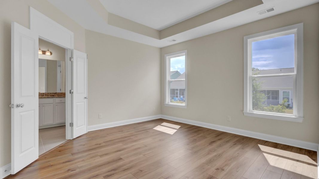 Spacious, unfurnished interior of a new home in Cresswind Charleston, Summerville (Image 29).