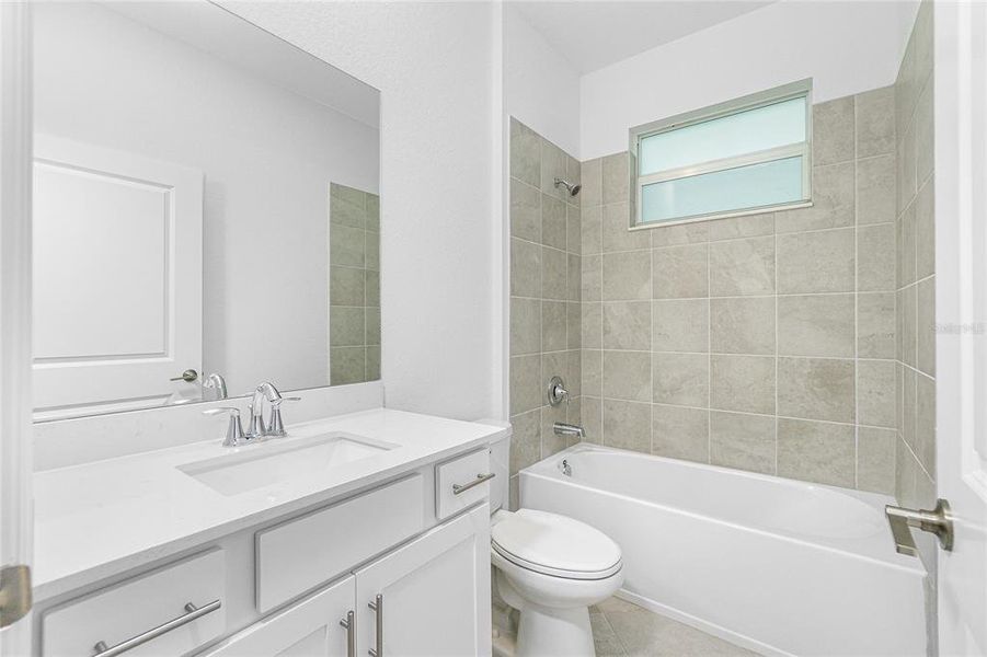 Furnished interior view inside a new home in Island Lakes at Coco Bay: Villas, Englewood (Image 7).