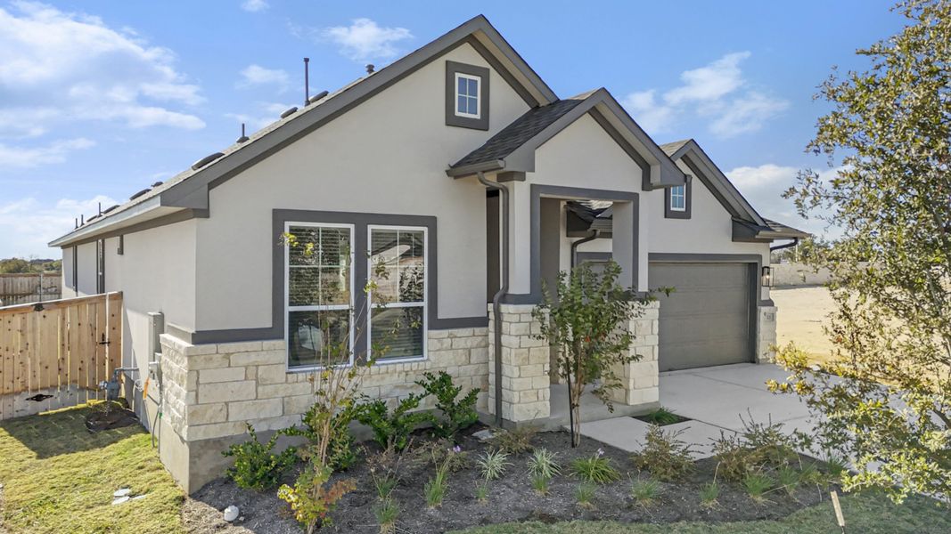 Front exterior of a new home in Highland Village, Georgetown, TX, highlighting curb appeal (Image 28).