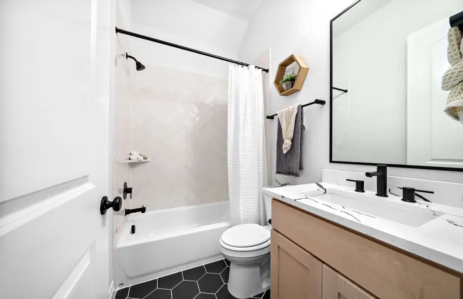 Representative furnished interior of a home built from the 2855 by Ravenna Homes in The Woodlands Hills 65′, Willis (Image 39).