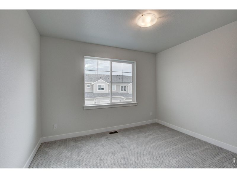 Spacious, unfurnished interior of a new home in The Lakes at Centerra - The Shores, Loveland (Image 32).