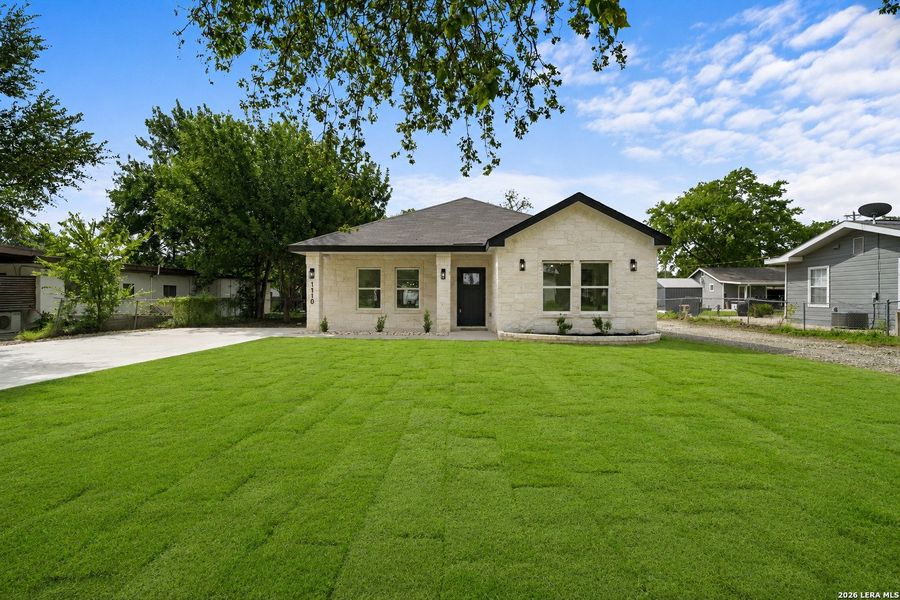 Front exterior of a new home in , Castroville, TX, highlighting curb appeal (Image 1). Front exterior of a new home in , Castroville, TX, highlighting curb appeal (Image 1).